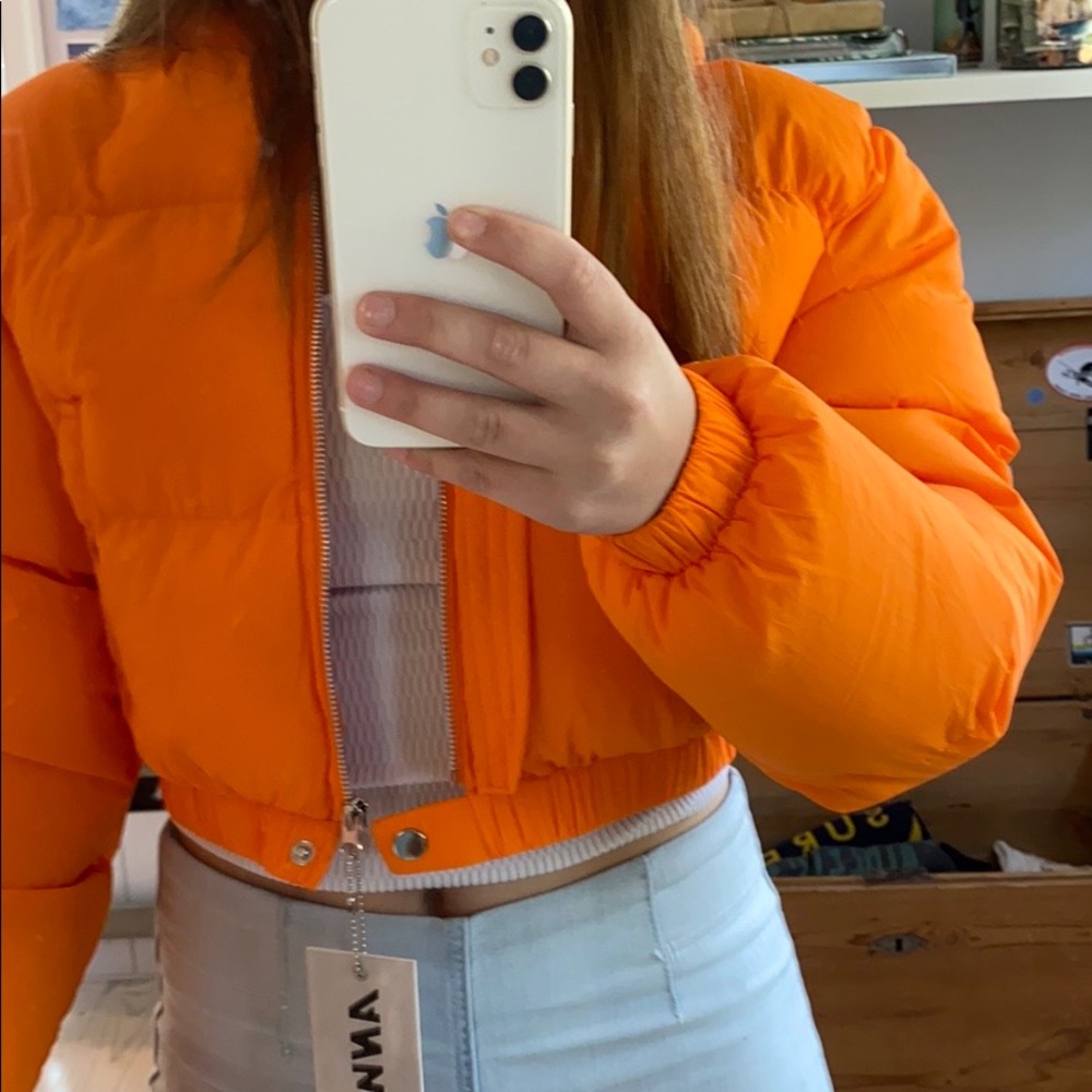 Orange puffer coat